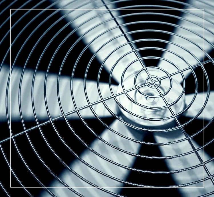 A close up of the blades on an air conditioner